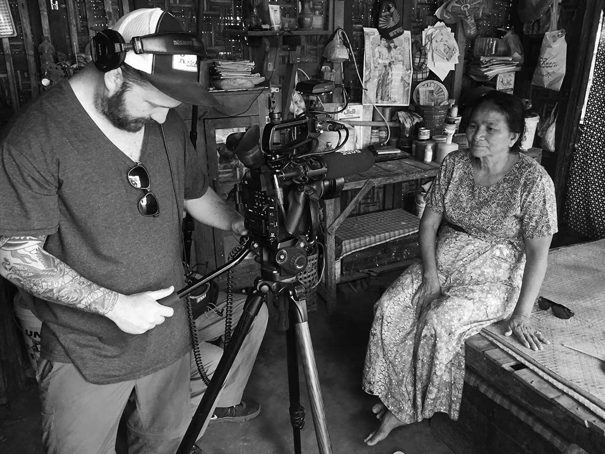 Steve Hebert filming an interview on location